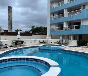 Praia da Enseada Apartment | Apartamento 23A para 6 pessoas com Piscina e Churrasqueira no Cond Torremolinos Beach a 80m para Pé na areia na Praia da Enseada Ubatuba