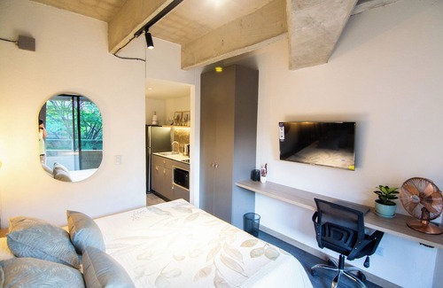 Suramericana Hotel | Apartamento Acogedor con Balcón
