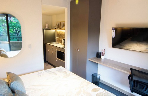 Suramericana Hotel | Apartamento Acogedor con Balcón