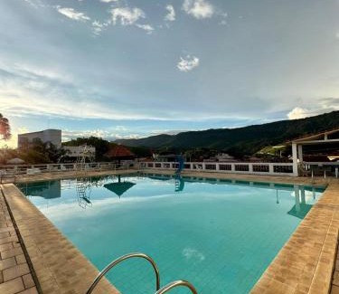 Lambari Apartment | Apartamento aconchegante em condomínio encantador.