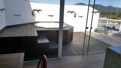 Cachoeira do Bom Jesus Apartment | Apartamento Duplex