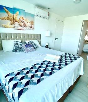 Centro Apartment | Apartamento frente ao Mar em Resort Pé na Areia