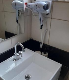 Embare Apartment | Apartamento Frente Praia Embaré - Varanda Aconchegante - Pet Friendly