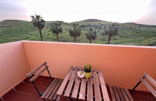 Camas Apartment | Apartamento Jardín de Atalaya