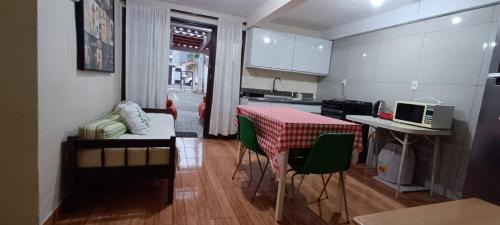 Centro Apartment | Apartamento térreo com ar condicionado e 2 suítes bem localizado