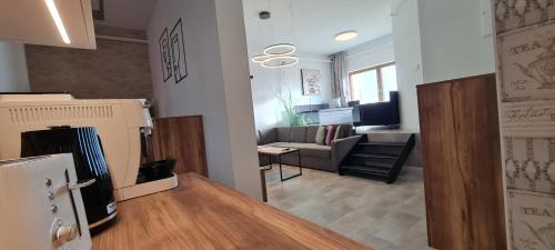 Krnov Apartment | Apartmán mezi stromy