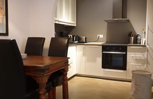Laugardalur Apartment | Apartm. in a family house with 2 bedr. and a living room with 2 beds