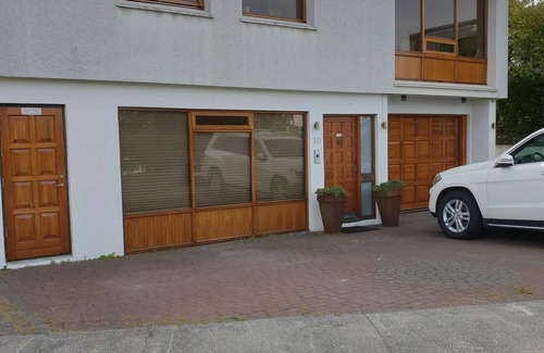 Laugardalur Apartment | Apartm. in a family house with 2 bedr. and a living room with 2 beds