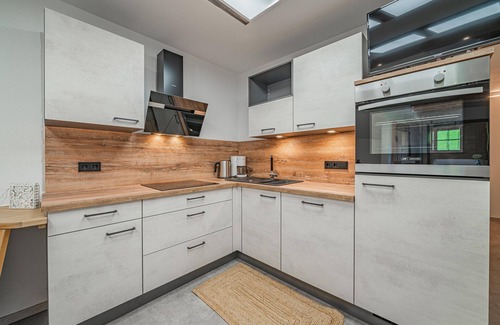 Hopfgarten Markt Apartment | Apartment on a farm with mountain views
