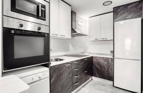 Monte Faro Apartment | Apartment 'Adosado En Gran Alacant Santa Pola' with Shared Pool and Air Conditioning