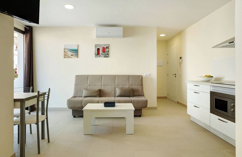 Playa de Mogan Apartment | Apartment Albamar 1A with Mountain View, Wi-Fi, A/C, Balcony & Terrace