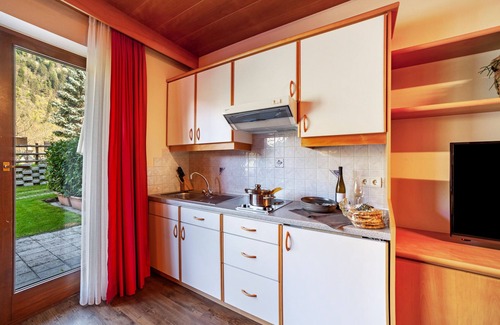 Saltusio Apartment | Apartment "Alpenhof Lodge Butterblume iii" with Mountain View, Pool & Sauna