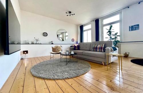 Ruhrort Apartment | Apartment "Am Rheinorange" LOFTSTYLE, 75 Zoll TV, Netflix & Prime, Boxspringbett