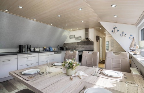 Ratekau Apartment | Apartment 'Ankerplatz Maria' with Shared Terrace, Shared Garden and Wi-Fi