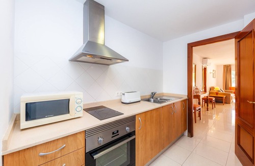 Cala Bona Apartment | Apartment 'Apartamento Espiga' with Shared Pool, Wi-Fi and Air Conditioning