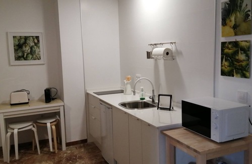 Santa Marina Apartment | Apartment 'Apartamento Planta Baja' with Shared Terrace, Wi-Fi and Air Conditioning