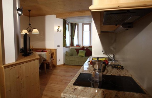 Rocca Pietore Apartment | Apartment 'Appartamento Bilo 4' with Mountain View, Shared Garden and Wi-Fi