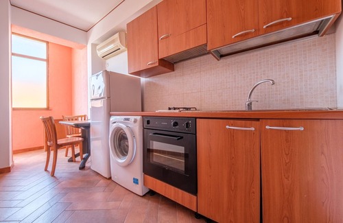 Mazzeo Apartment | Apartment 'Appartamento Bougainville' with Sea View, Wi-Fi and Air Conditioning