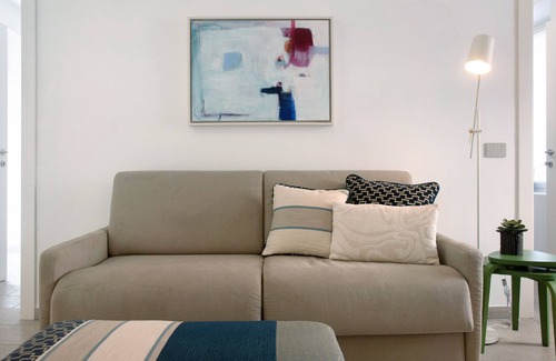 Lavena Ponte Tresa Apartment | Apartment 'Atelier Milvia 1' with Private Terrace, Private Garden and Wi-Fi