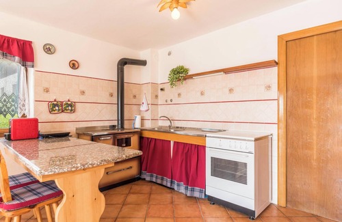 Sella Giudicarie Apartment | Apartment "Baita Località Cap" with Garden & Mountain View