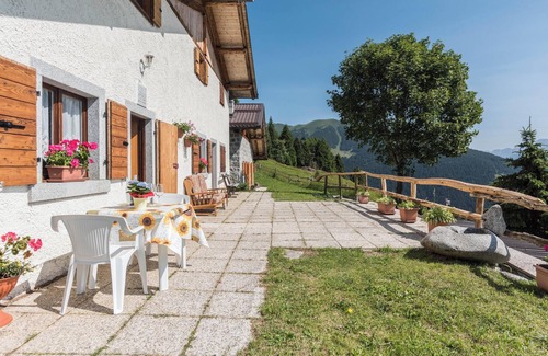 Sella Giudicarie Apartment | Apartment "Baita Località Cap" with Garden & Mountain View