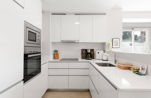 Caleta de Velez Apartment | Apartment 'Baviera Hills 1A' with Garden, Shared Pool & Wi-Fi