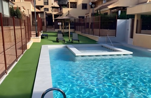 Los Geraeos Apartment | Apartment 'Brisa Del Mar' with Shared Pool, Wi-Fi and Air Conditioning