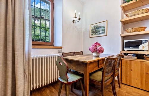 Sella Giudicarie Apartment | Apartment "Casa Nel Borgo Iris" with Mountain View and Shared Garden