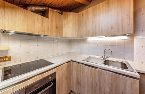 Vigo di Fassa Apartment | Apartment "Ciasa Sommavilla Mansarda" with Mountain View, Shared Garden & Wi-Fi