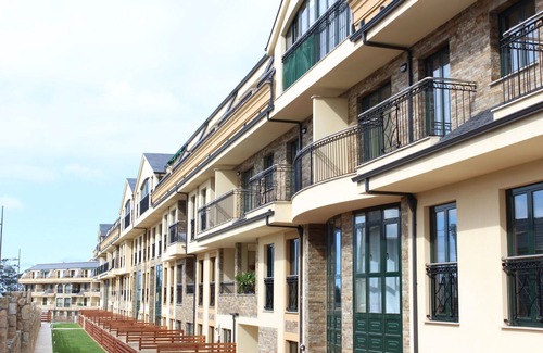 Barreiros Apartment | Apartment Costa Reinante Spa Beach Las Catedrales. Urbanization with spa.