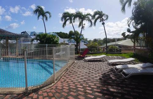 Sainte-Anne Apartment | Apartment Dahlia (500 m from the Pointe Marin BEACH, with SWIMMING POOL)