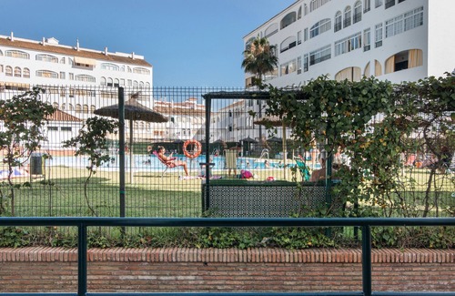 El Portil Apartment | Apartment 'El Portil' with Shared Pool, Wi-Fi and Air Conditioning