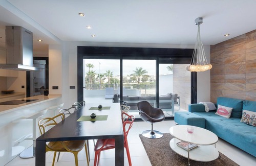 Mil Palmeras Apartment | Apartment in Mil Palmeras with Sea View, Pool, Garden, Terrace, A/C & Wi-Fi