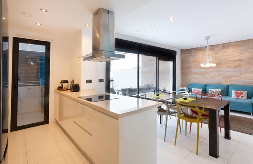 Mil Palmeras Apartment | Apartment in Mil Palmeras with Sea View, Pool, Garden, Terrace, A/C & Wi-Fi