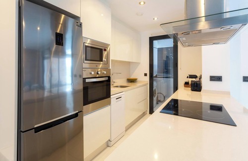 Mil Palmeras Apartment | Apartment in Mil Palmeras with Sea View, Pool, Garden, Terrace, A/C & Wi-Fi