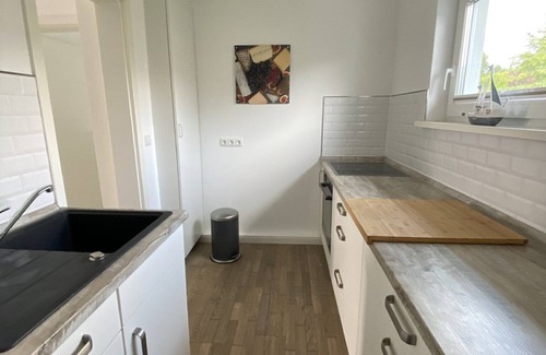 Haffkrug House | Apartment 'Ferienhaus Lütt Hus An D'see' with Private Terrace, Private Garden and Wi-Fi