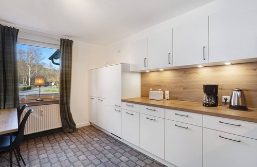Ortsmitte Apartment | Apartment 'Ferienwohnung Huckelberg' with Balcony and Wi-Fi