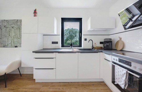 Langenbach bei Kirburg Apartment | Apartment 'Ferienwohnung Im Westerwald' with Private Terrace, Shared Garden and Wi-Fi