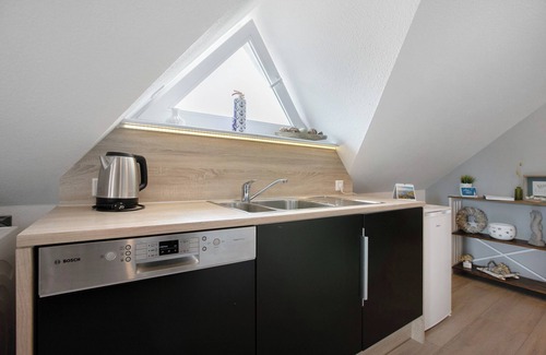 Ostenfeld Apartment | Apartment 'Ferienwohnung Huus 39' with Shared Garden, Balcony and Wi-Fi