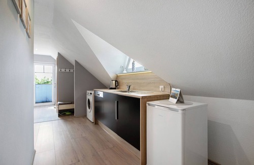 Ostenfeld Apartment | Apartment 'Ferienwohnung Huus 39' with Shared Garden, Balcony and Wi-Fi