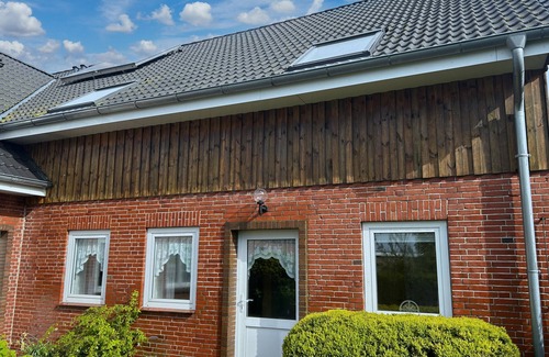 Hallig Langeneß Apartment | Apartment 'Ferienwohnung Uthlande' with Shared Terrace, Shared Garden and Wi-Fi