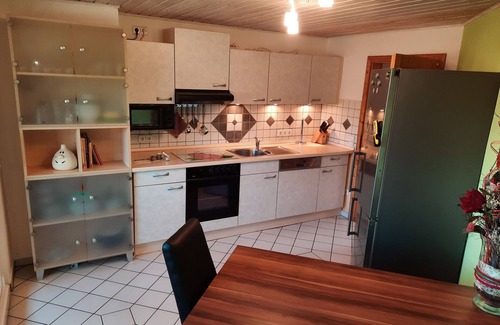 Hollfeld Apartment | Apartment 'Fewo Tanja's Blumenparadies' with Private Terrace, Shared Garden and Wi-Fi