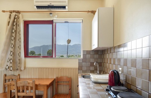 Tingaki Apartment | Apartment 'Golden Sun Two-bedroom Apt 1' with Sea View, Shared Pool and Wi-Fi