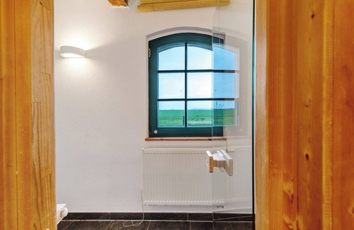 Gingst Apartment | Apartment 'Gut Rattelvitz - Parterre Ost' with Sea View, Private Terrace and Wi-Fi