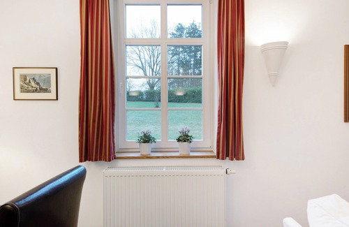 Gingst Apartment | Apartment 'Gut Rattelvitz - Parterre Ost' with Sea View, Private Terrace and Wi-Fi