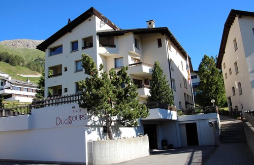 Celerina-Schlarigna Apartment | Apartment house on the hillside of Celerina.