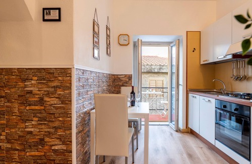 Loceri Apartment | Apartment 'Il Cinghiale Bianco' with Balcony, Wi-Fi and Air Conditioning