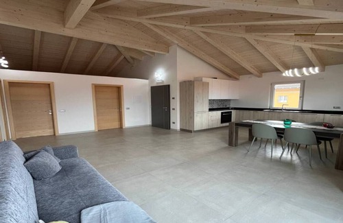 Taio Apartment | Apartment 'Il Melario' with Mountain View, Shared Garden and Balcony
