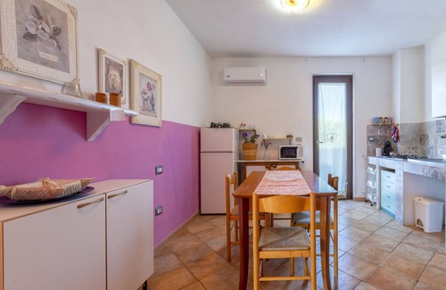 Olmedo Apartment | Apartment in "Casa Vacanze Oleandro" with Wi-Fi, Garden & Terrace