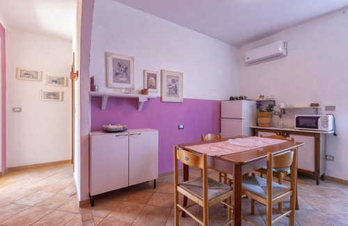 Olmedo Apartment | Apartment in "Casa Vacanze Oleandro" with Wi-Fi, Garden & Terrace